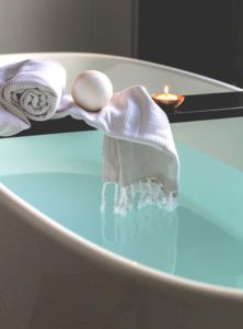 Change your mood with Bathtub filled with water and candles