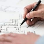 Architect Drawing a scale of a home