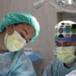 Man and women surgeon in operating room