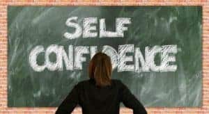 self-confidence written on chalk board