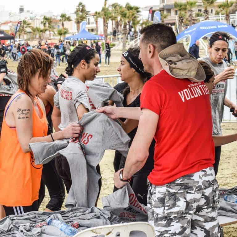 man in red shirt volunteering